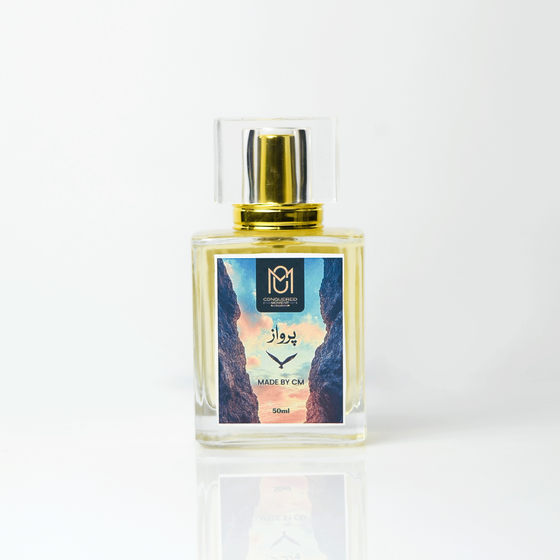 Perfume bottle with gold cap on a white background